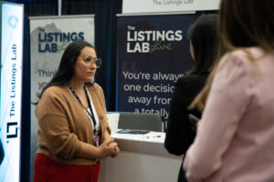 Picture of Jess Lenouvel Speaking to Attendees at the Listing Lab Event in 2022.